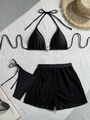 Detailed view of black three-piece bikini set with starfish ornament and mesh cover-up skirt - S / Black