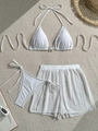 Detailed flat lay of white three-piece bikini with starfish buckle and crochet shorts - S / White