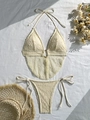 Chic off-white crochet bikini set with halter top, side-tie bottom, and gold ring accents - S / Beige