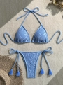 Detail of light blue crochet bikini set with floral texture and tassel tie side details - S / Blue