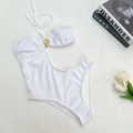 Detail of white textured one-piece swimsuit with asymmetric cut and golden metal buckle - S / White