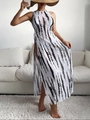Detail of high side slit and abstract zebra print on a white sleeveless maxi dress - S / Black and White Print