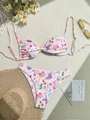 Flat lay detail of floral bikini set with spaghetti straps and summer beach accessories - S / Pink