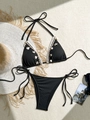 Flat lay of black ribbed bikini with white lace trim, seashells and starfish details - S / Black