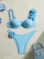 Detailed view of light blue bikini featuring 3D rose floral accents and steel underwire - S / Blue