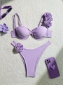 Detailed view of lavender bikini with 3D floral accents and underwire top on plush background - S / Purple