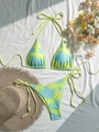 Flat lay of tie-dye bikini set with side-tie bottoms and summer vacation accessories - S / Yellow