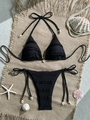 Detail of black textured bikini set with natural shell accents on beach woven mat - S / Top And Bottom / Black