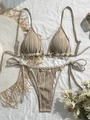Detail of beige ribbed bikini featuring crochet lace trim and seashell starfish charms - S / Brown