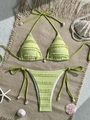 Detail of light green ruched bikini set with ruffled edges and white seashell tassels - S / Green
