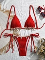 Detail of red ribbed bikini with seashell charms and delicate white lace trim accents - S / Red