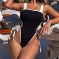 One-piece swimsuit in black and white ribbed fabric with adjustable side bow ties - S / Black