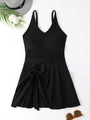Detail of black one-piece plus size swim dress with waist cut and side twist knot detail - Black