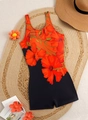 Flat lay of a one-piece swimsuit with red flower patterns on a straw mat background - S / Black with Red Floral