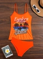 Flat lay of an orange bikini set with tropical beach print on a dark wooden background - S / Orange