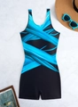 Detail of one-piece boyleg swimsuit with blue abstract print on marble background - S / Black Blue Abstract