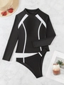 Posa piatta di costume da bagno sportivo a maniche lunghe da donna con linee geometriche - S / Patchwork Nero Bianco
