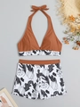 Flat lay of rust-red halter bikini top and floral high-waisted shorts on summer background - S / Brown