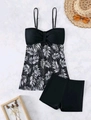 Flat lay of a two-piece tankini set with palm leaf print and high waisted boy shorts - S / Black (Palm Leaf)