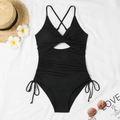Flat lay of ribbed black one-piece swimsuit with cross straps and side drawstring details - S / Black