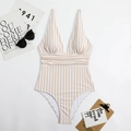 Close-up of V-neck striped one-piece swimsuit with flattering waist pleats and ruffles - S / Brown