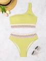 Flat lay of light green one-shoulder bikini set with smocked fabric and rainbow embroidery - S / Yellow