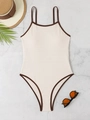 Close-up of beige ribbed one-piece swimsuit with brown trim and resort accessories - S / Khaki