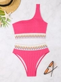 Flat lay of pink one-shoulder bikini set with colorful embroidery on marble background - S / Pink