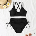 Flat lay of black ribbed bikini with drawstring sides and cross-back straps detail - S / Black