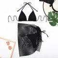 Detailed flat lay of black three-piece bikini set with mesh skirt and summer accessories - S / Black