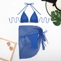 Flat lay of royal blue three-piece crochet bikini set with mesh sarong and beach accessories - S / Blue