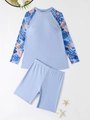 Flat lay of women's two-piece long sleeve tankini set with tropical floral print sleeves - 1XL / Gray