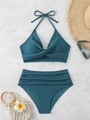 Detailed flat lay of a high-waisted ribbed bikini with knot front in deep teal finish - S / Teal