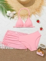 Detailed view of pink three-piece girls bikini set with mesh skirt and beach accessories - Peach