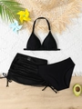 Detailed view of black three-piece bikini set with mesh skirt on a summer beach backdrop - Black