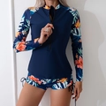 Women's long sleeve two-piece surfing swimsuit with tropical floral print and navy blue base - S / Blue With Orange Flower