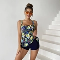 Women's tankini set featuring blue floral print top and solid boy shorts - S / Yellow Floral