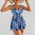 Detail of V-neck tankini swimsuit featuring dark blue paisley print and flared skirt - S / Navy Blue