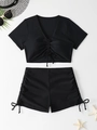Close-up of black two-piece bikini with drawstring details and high waist swim shorts - S / Black