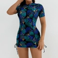 Detail of tropical print surf swimsuit featuring front zipper and adjustable side drawstrings - S / Navy Green Leaf