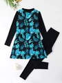 Flat lay view of long-sleeve two-piece swimsuit with tropical leaf print on white background - S / Black and Blue