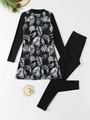Detailed flat lay of long-sleeve burkini swim suit with tropical palm leaf prints - S / Black