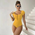 Detail of ginger yellow short sleeve bodysuit featuring front zipper with ring puller - S / Ginger Yellow