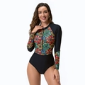 Detailed close-up of geometric pattern and zip collar on long sleeve surfing swimsuit - S / Black