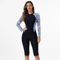 Close-up of long sleeve floral print swimsuit with front zipper and side blue panels - XS / 1103 Black + Purple Flower