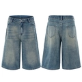 Men's loose vintage wash blue denim shorts featuring cat whisker patterns and wide legs - S / Vintage Blue
