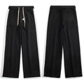 Pantaloni sportivi neri retrò a gamba larga con strisce laterali bianche - M / Nero