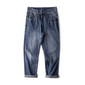 Dunkelblaue Straight-Leg-Jeans mit Vintage-Waschung und stylisch umgeschlagenen Säumen - EU 28 / Blau