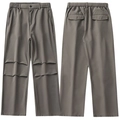 Dunkel-khaki Herrenhose mit lockerer Passform, Falten am Knie und hinteren Pattentaschen - S / Braun