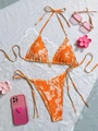 Orange tropical floral bikini set with metal flower pendant and side-tie bottom - S / Orange